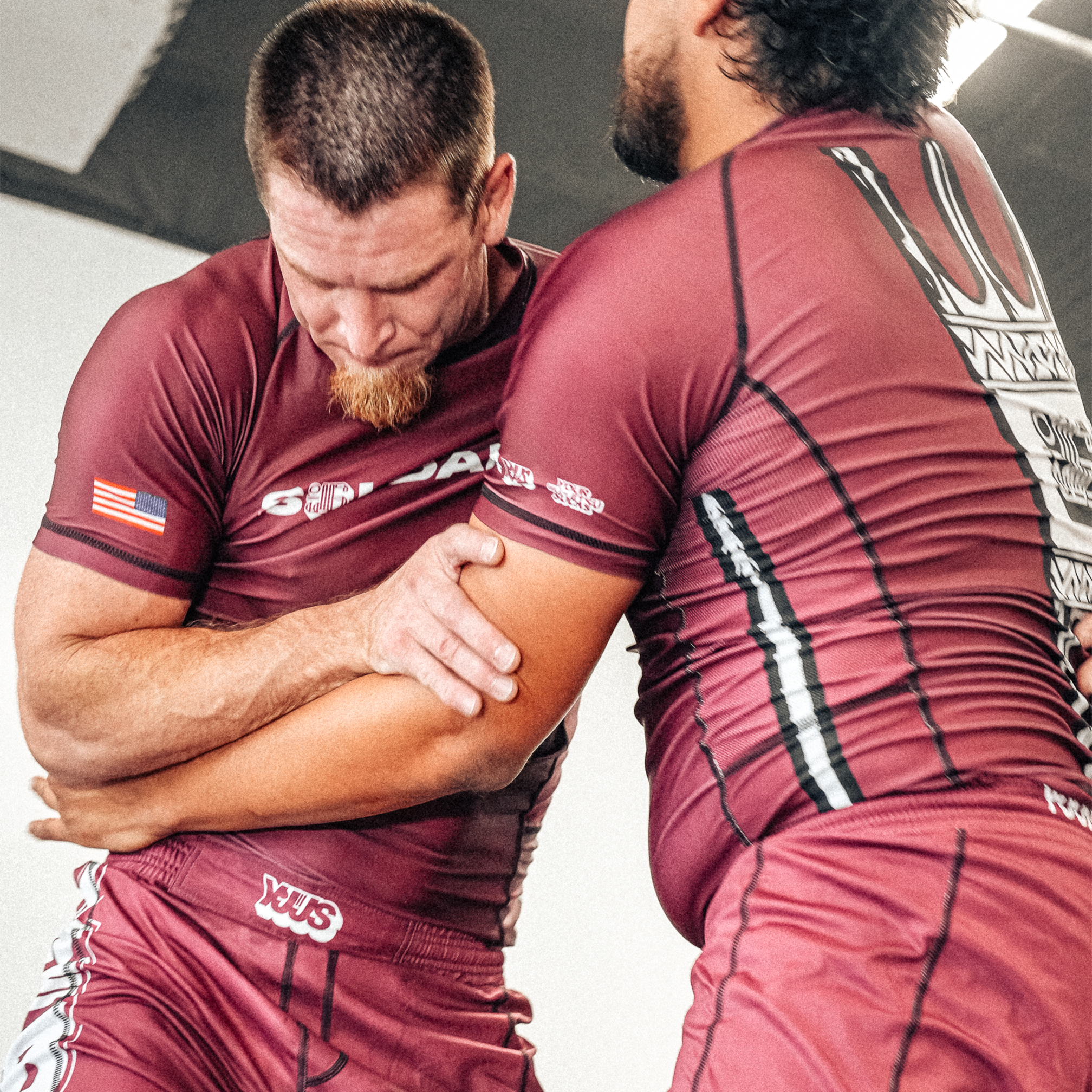 YJJS SNS Black Rashguard (Burgandy)